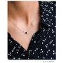 0.5 carat black diamond solitaire bezel necklace - sample on a model