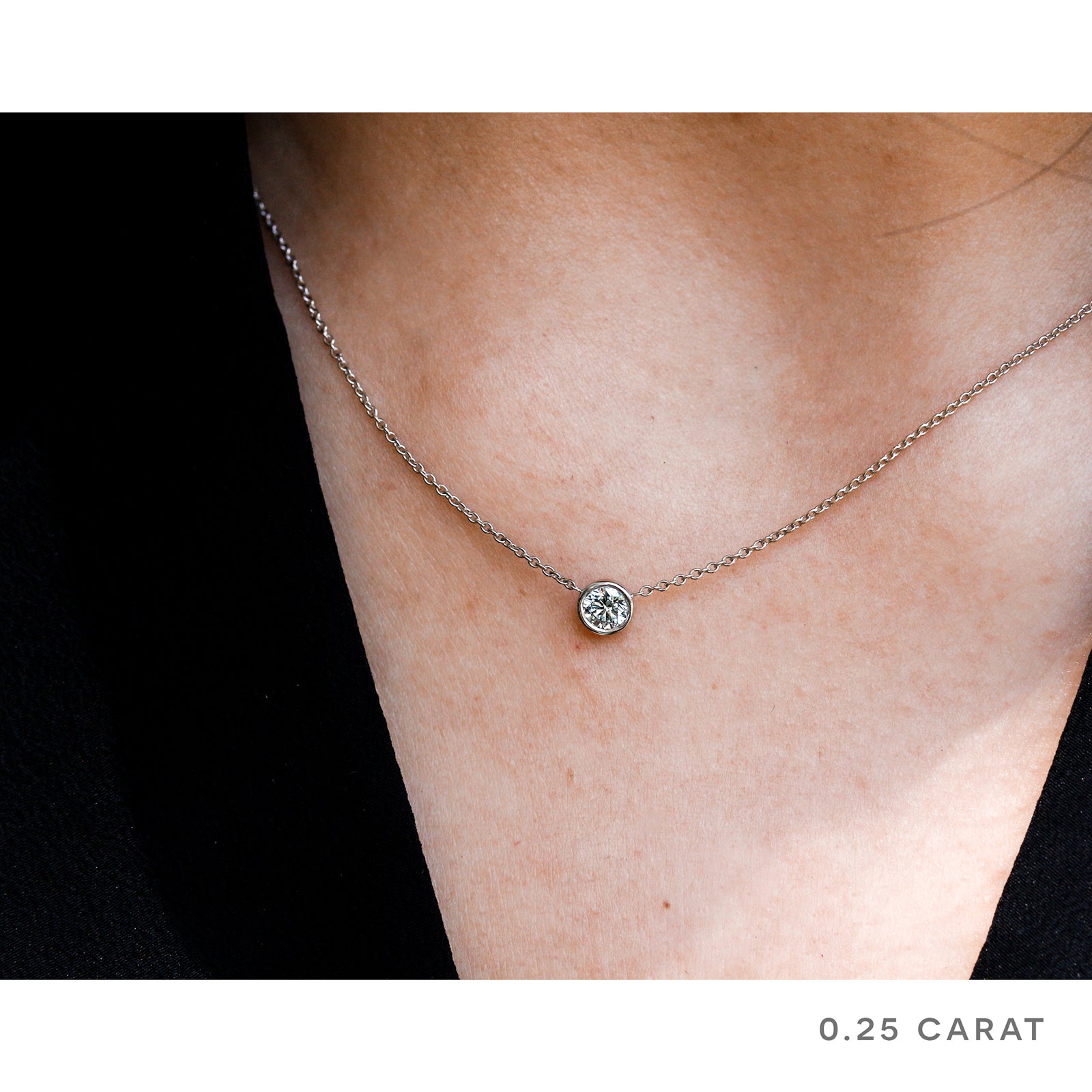 0.25 carat solitaire bezel necklace - sample on a model