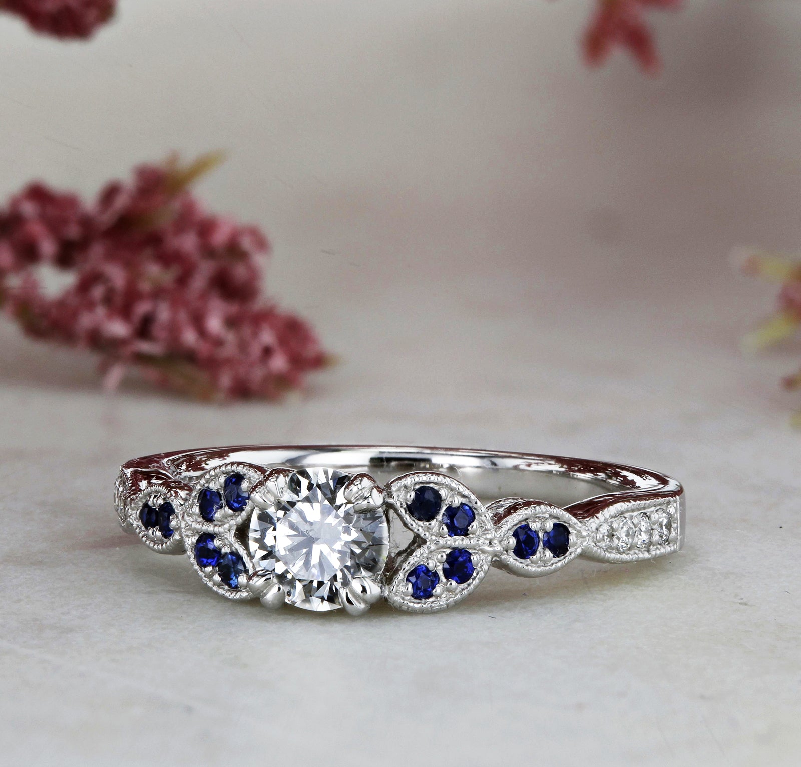 1.2 Carat Moissanite Floral Blue Accent Iris Ring