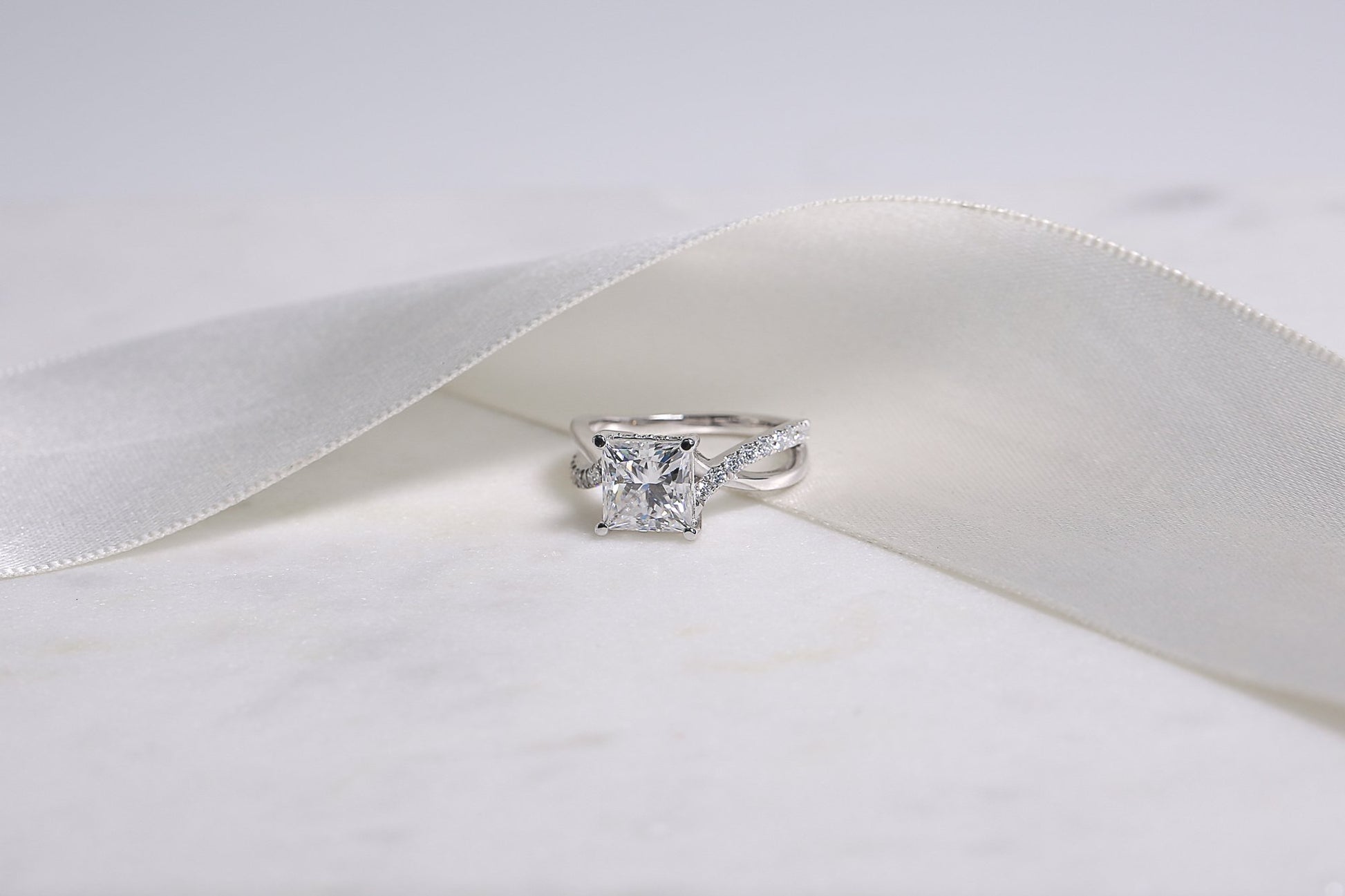 Kobelli 2 Carat Lab-grown Diamond Accented Ribbon Bypass Moissanite Engagement Ring