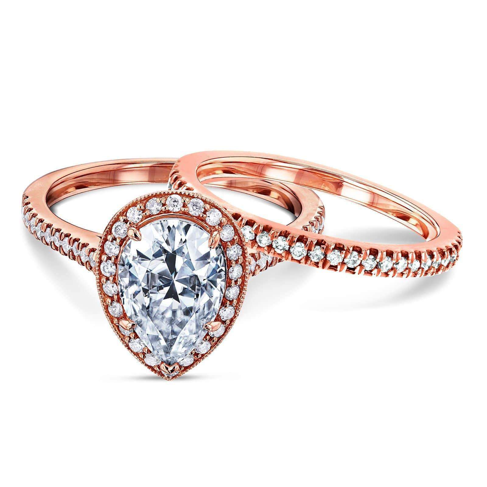 Kobelli Pear Shape Moissanite Halo Bridal Set (2 3/5 CTW)