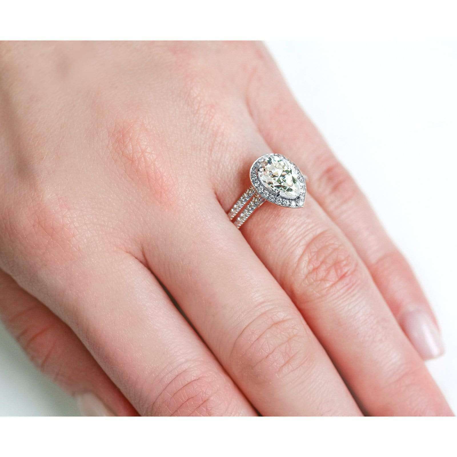 Kobelli Pear Shape Moissanite Halo Bridal Set (2 3/5 CTW)