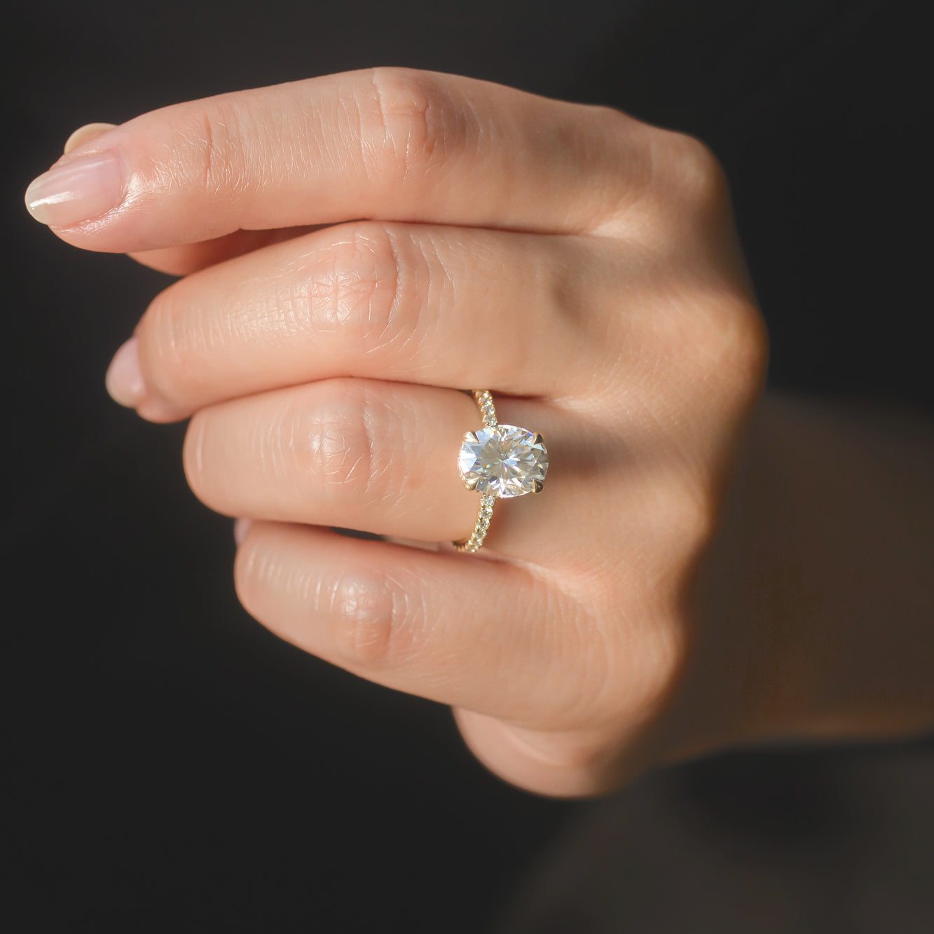 Kobelli Ori Engagement Ring on a hand