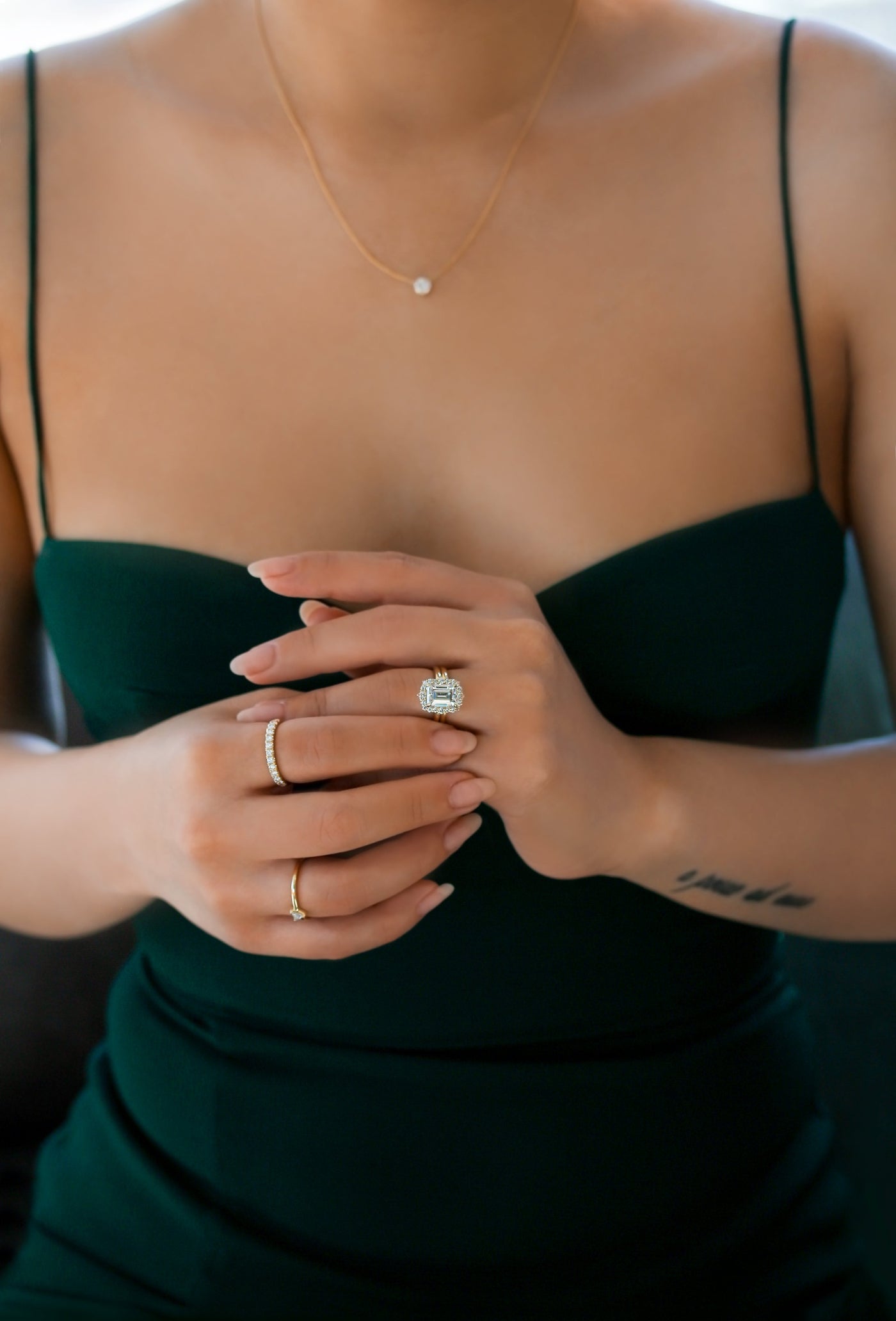 Kobelli diamond and gold jewelry on a model - featuring the Elizabeth Engagement Ring