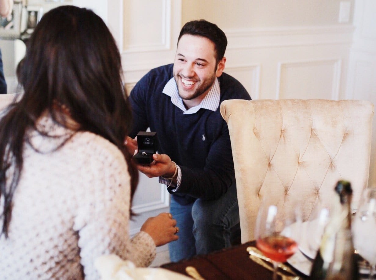 Smiling Boyfriend Proposing With A Kobelli Engagement Ring