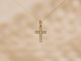 Cross pendant strung to chain