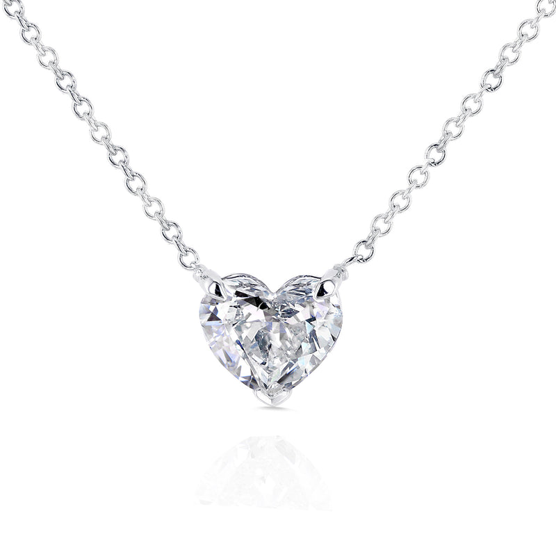 Heart shaped solitaire diamond attached to delicate chain