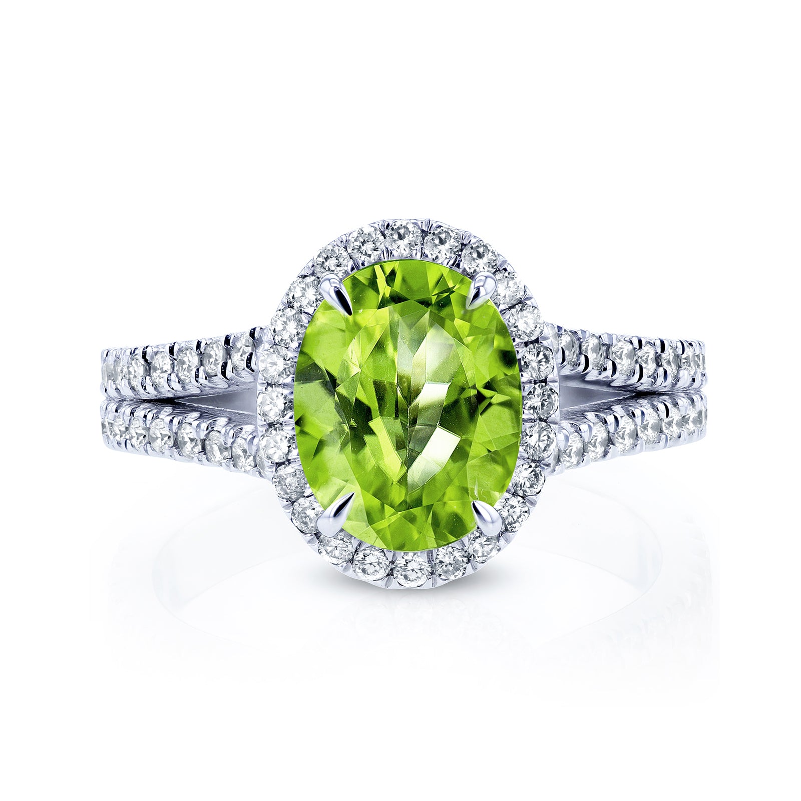 oval green peridot gemstone with white diamond halo and diamond lined split shank in 14k white gold