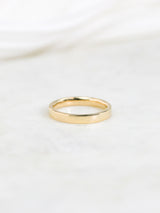 3mm Cigar Band by Kobelli in Yellow Gold flatlay