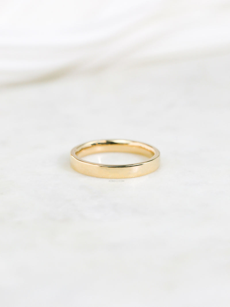 3mm Cigar Band by Kobelli in Yellow Gold flatlay