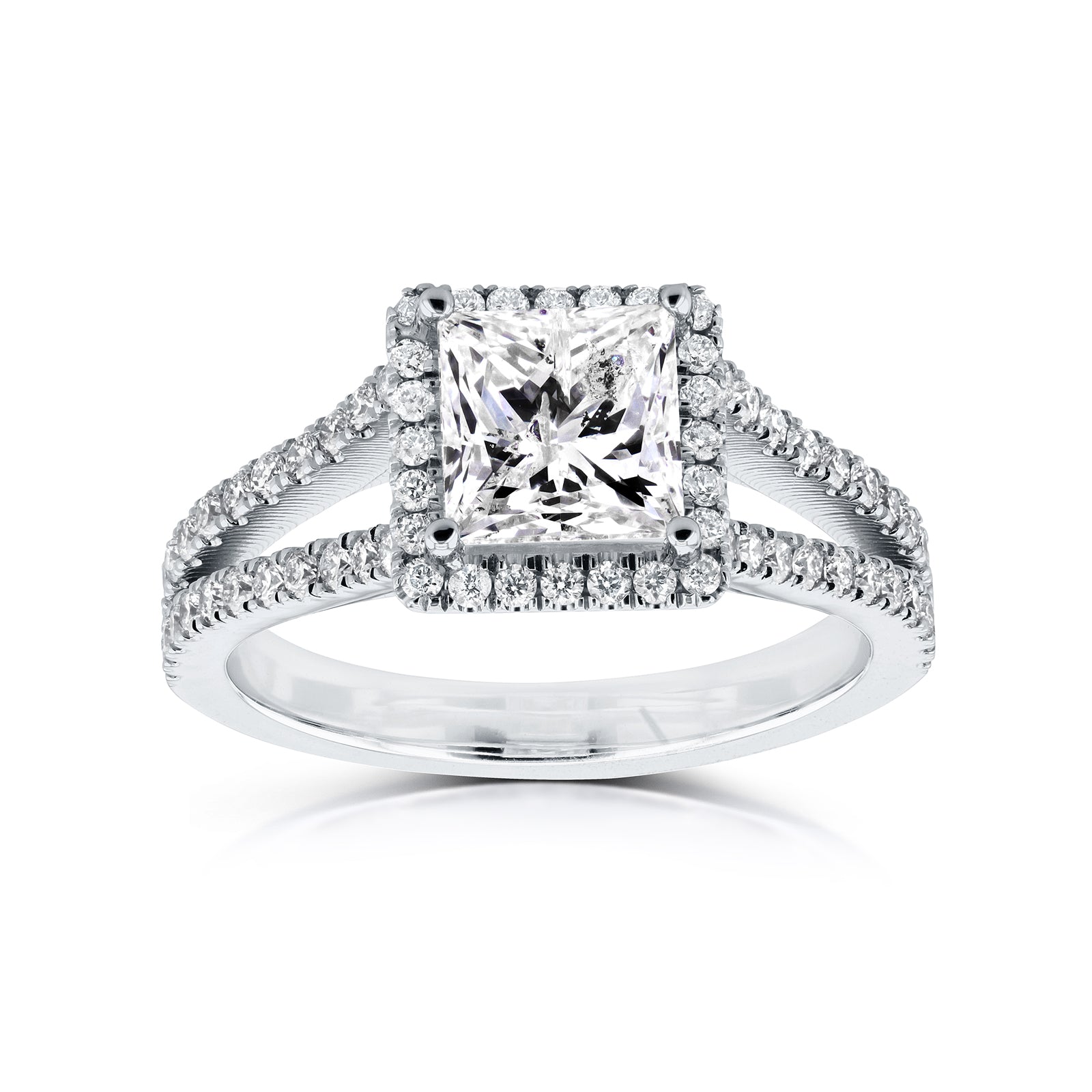 A princess-cut diamond engagement ring with a halo setting and a split shank paved with small round diamonds, shown on a clean white background.