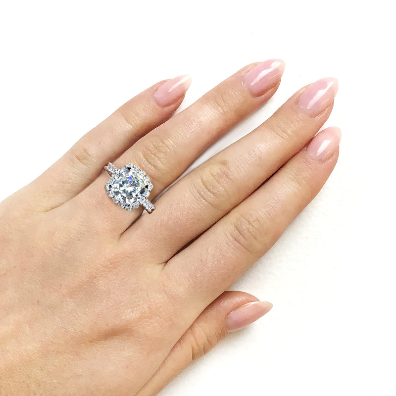 Candelabra Halo Ring on a hand - top-facing angle
