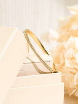 Lab Grown Diamond Bangle in Yellow Gold - smaller diamonds halfway around