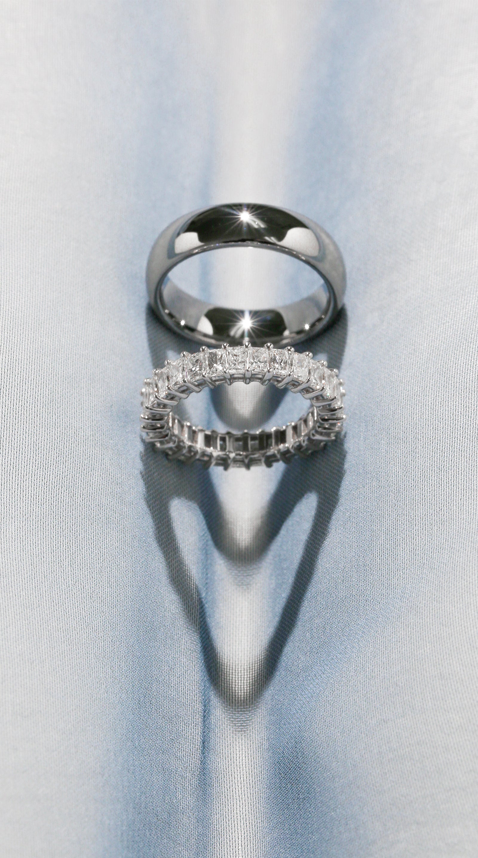 Kobelli Wedding Bands - Dion Ring and Felicity Ring - A Solid White Metal Rounded Band and a Princess Baguette Diamond Eternity Band in White Gold