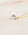 The diamond is held on the left and right to help deter unwanted spinning