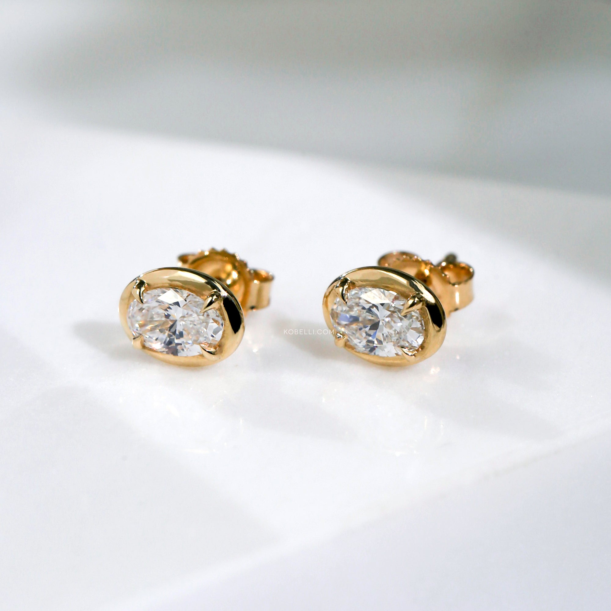 0.66 Carat Lab Grown Diamond Oval Chubby Bezel Studs