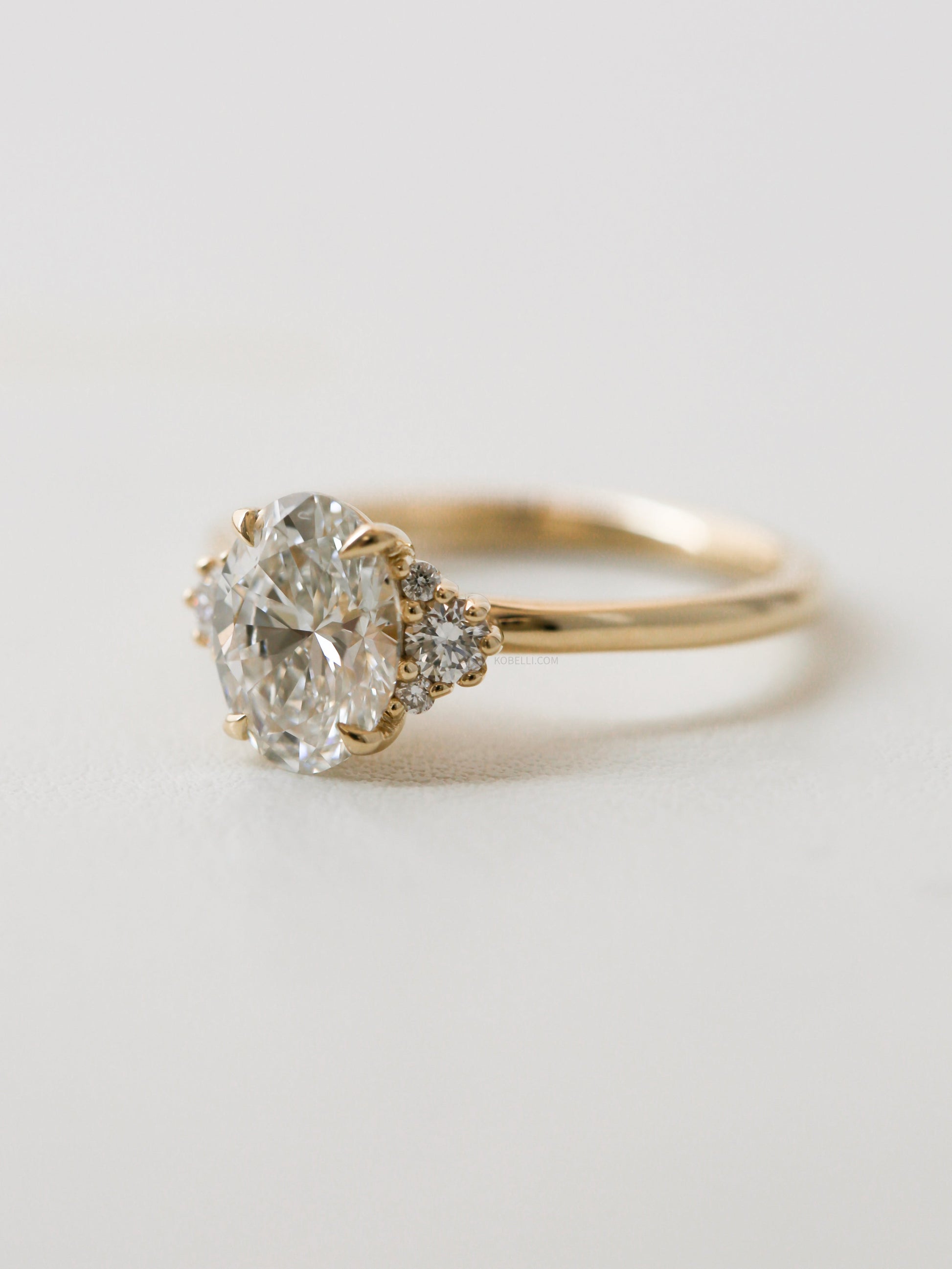 Kobelli Oval Diamond Side Cluster Ethical & Sustainable Ring