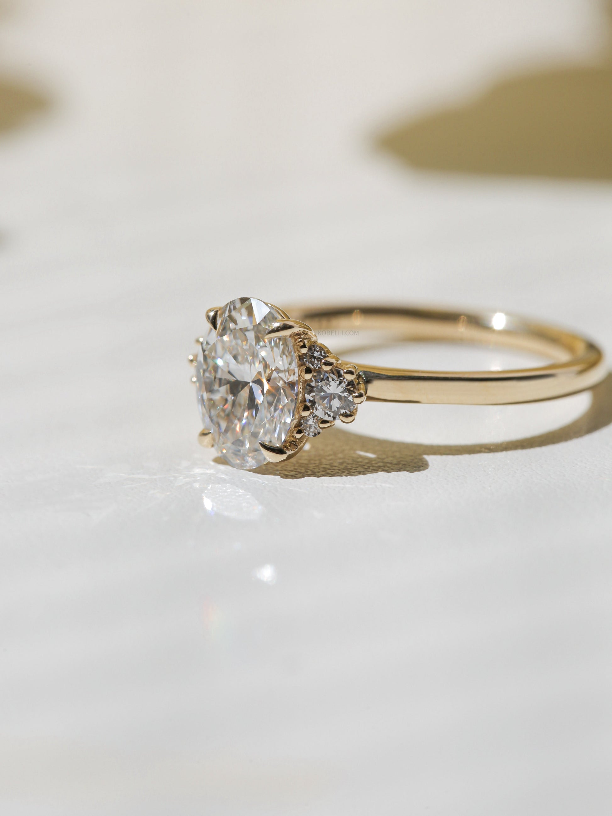 Kobelli Oval Diamond Side Cluster Ethical & Sustainable Ring