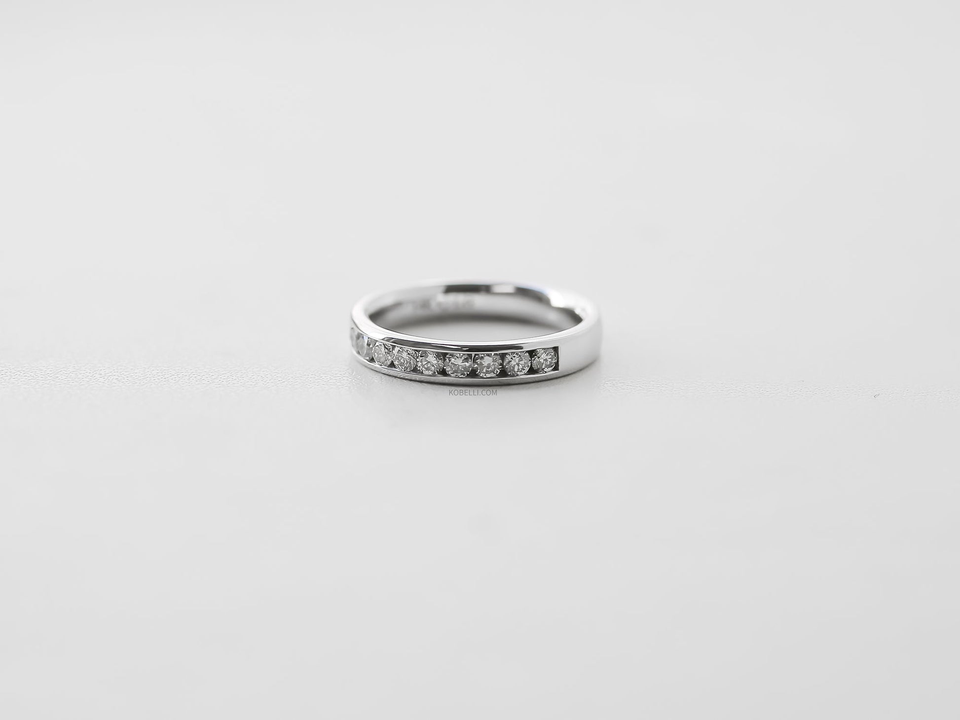 Kobelli Round Diamond Channel Band