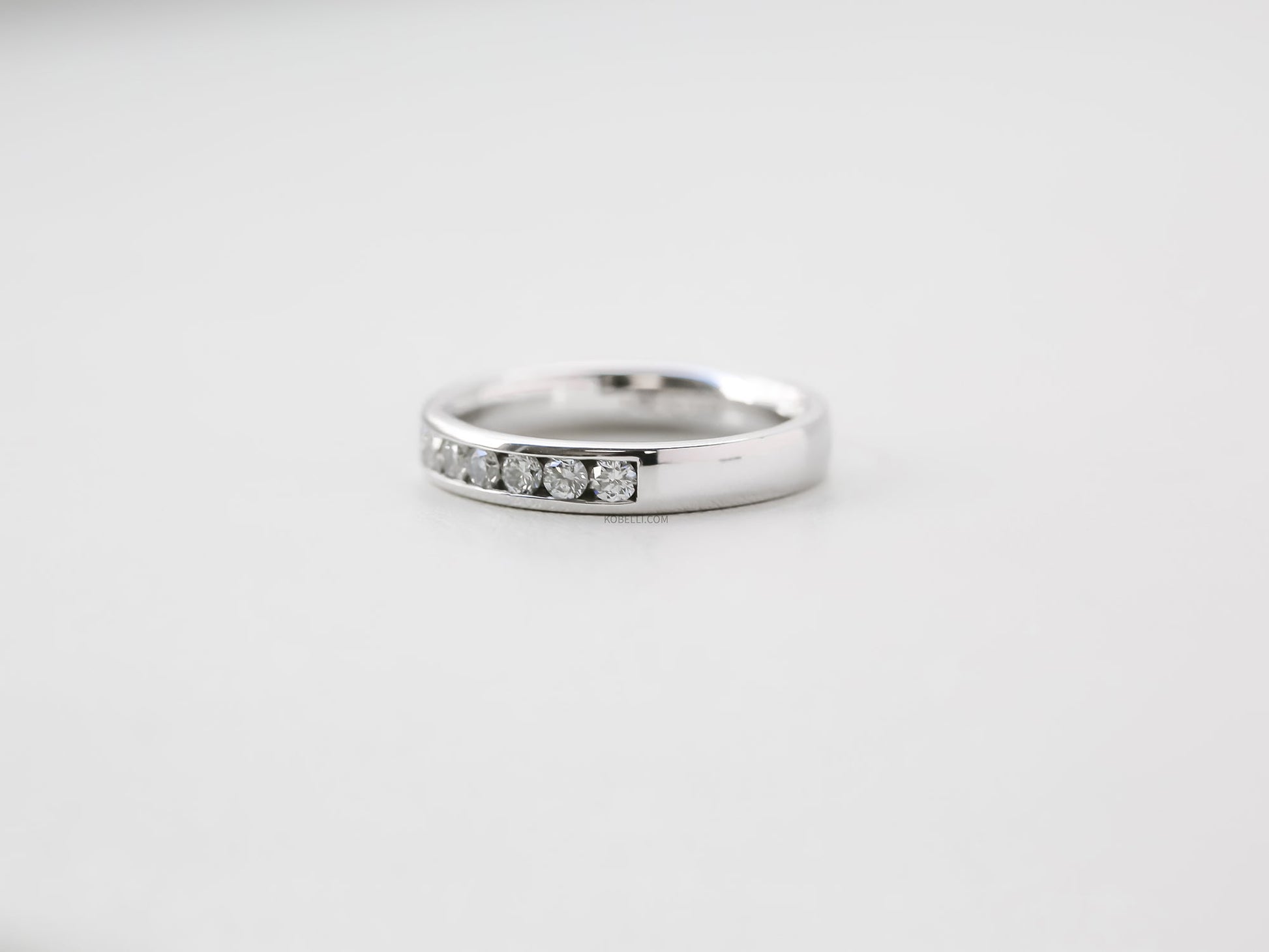 Kobelli Round Diamond Channel Band