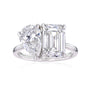 toi et moi ring with two large diamonds, one rectangular shape emerald step-cut, and one pear shape brilliant-cut in white gold