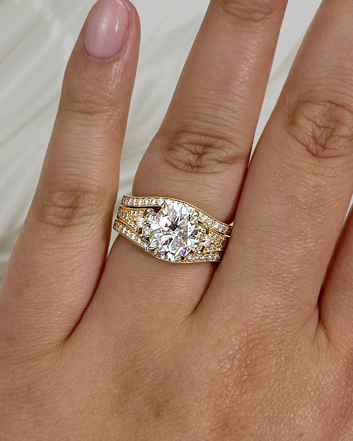 3 Carat Lab Grown Diamond Interlaken 3pc Bridal Set - Yellow Gold Size 7 on a hand