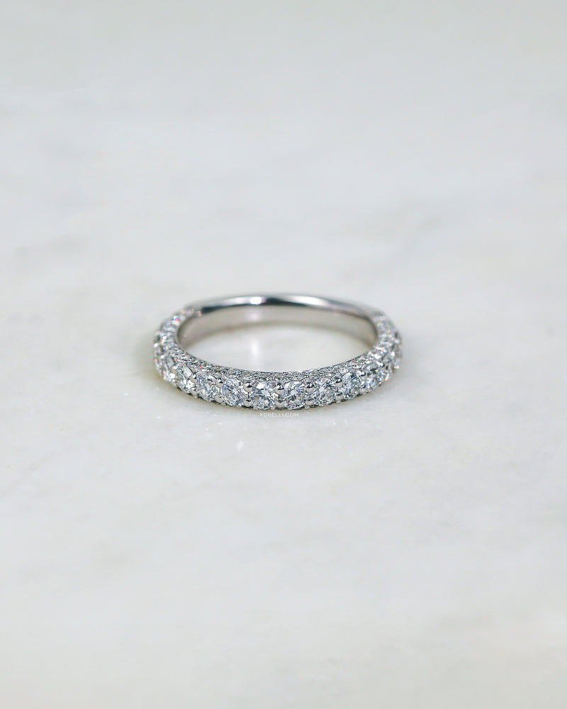 an abundance of diamonds line the ring