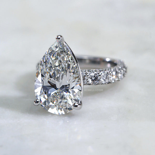 Kobelli Grown Pear Diamond Engagement Ring on table