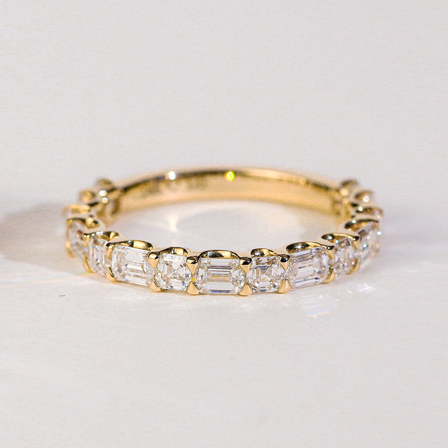 alternating emerald and asscher diamonds