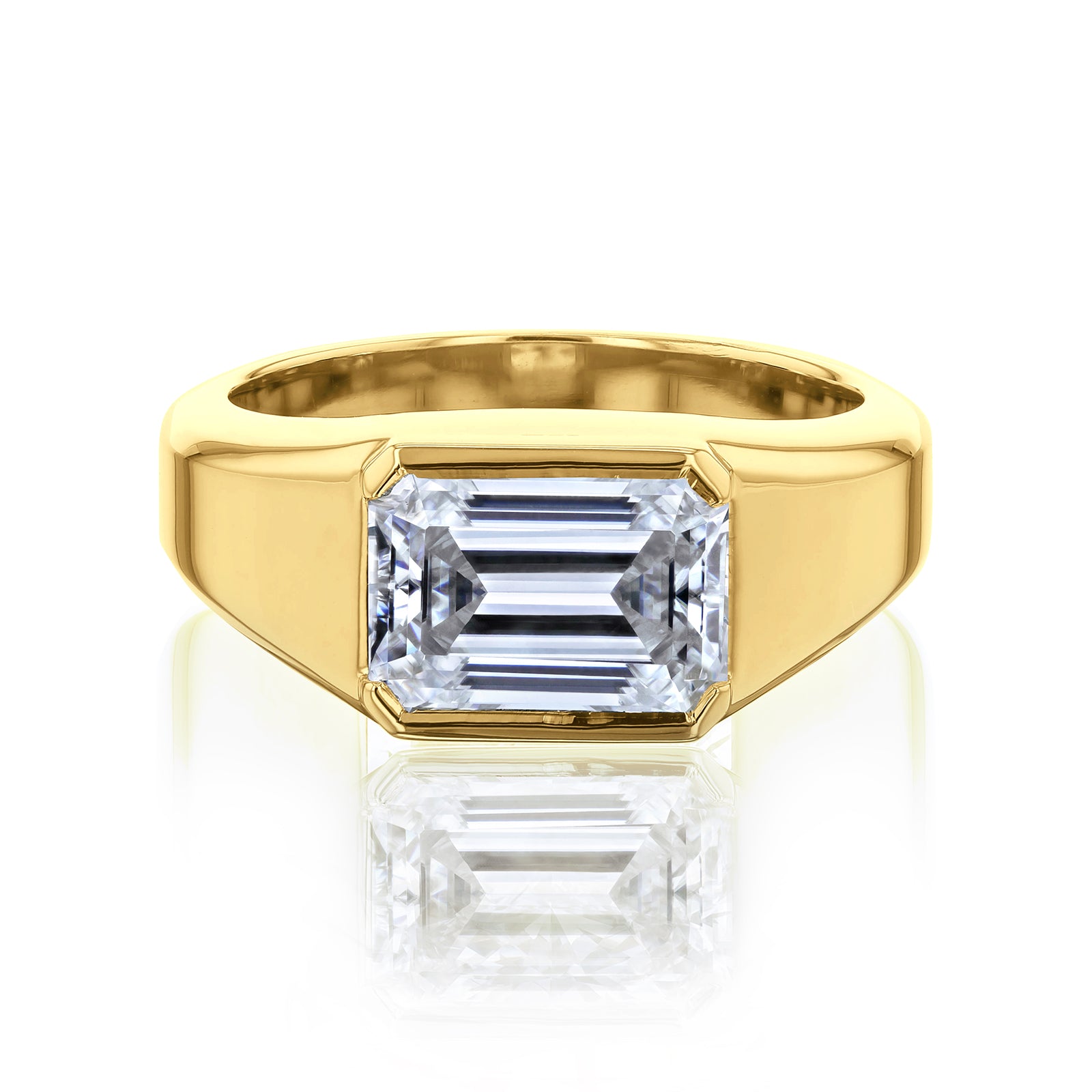 Kobelli emerald-cut diamond solitaire engagement ring on a chunky wide yellow gold band - stone set with 2-sided bezel in east-west direction