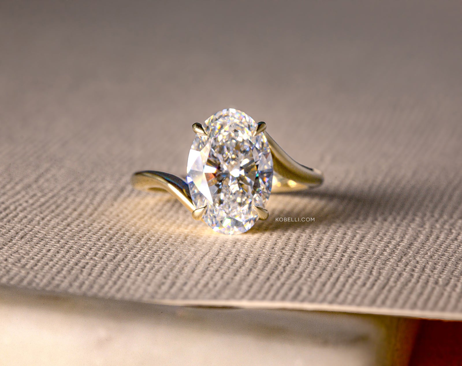 Kobelli Josie Ring lifestyle image in taupe setting