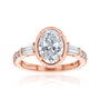 Kobelli Sona Ring - A collect-set oval diamond with tapered baguette side diamonds forming to a classic three-stone design along with a half eternity of round diamonds along the band - rose gold option lifted front view