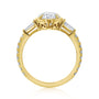 Kobelli Sona Ring - A collect-set oval diamond with tapered baguette side diamonds forming to a classic three-stone design along with a half eternity of round diamonds along the band - yellow gold option standing profile view
