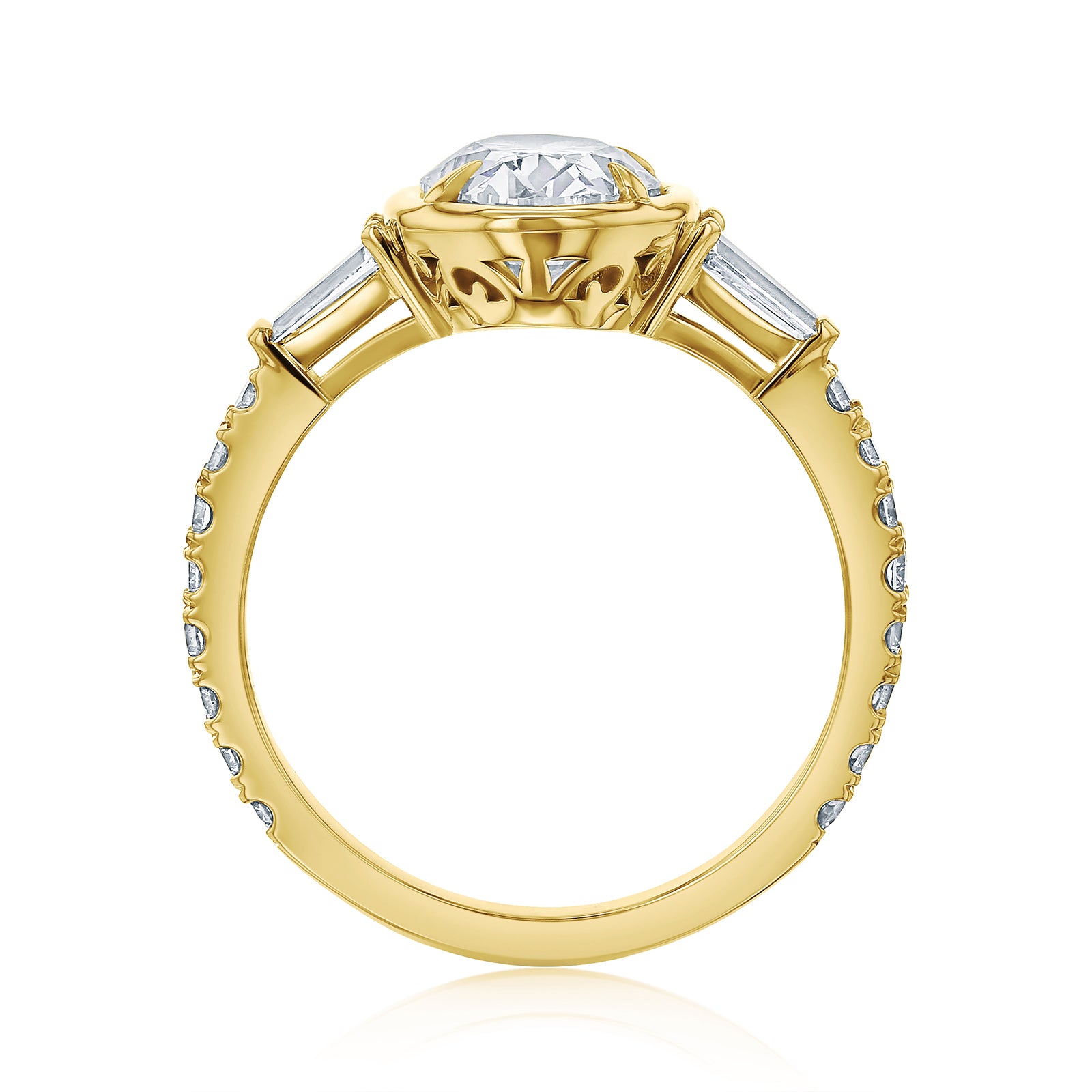 Kobelli Sona Ring - A collect-set oval diamond with tapered baguette side diamonds forming to a classic three-stone design along with a half eternity of round diamonds along the band - yellow gold option standing profile view