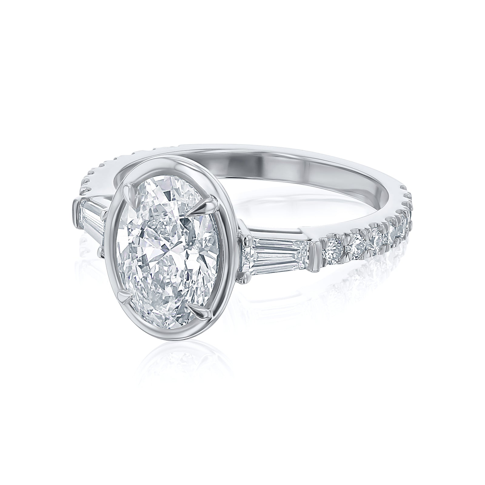 Kobelli Sona Ring - A collect-set oval diamond with tapered baguette side diamonds forming to a classic three-stone design along with a half eternity of round diamonds along the band - white gold option side view