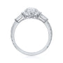 Kobelli Sona Ring - A collect-set oval diamond with tapered baguette side diamonds forming to a classic three-stone design along with a half eternity of round diamonds along the band - white gold option standing profile view