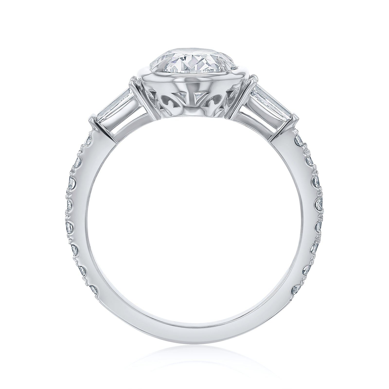 Kobelli Sona Ring - A collect-set oval diamond with tapered baguette side diamonds forming to a classic three-stone design along with a half eternity of round diamonds along the band - white gold option standing profile view