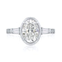 Kobelli Sona Ring - A collect-set oval diamond with tapered baguette side diamonds forming to a classic three-stone design along with a half eternity of round diamonds along the band - white gold option top view