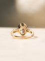 Kobelli Sona Ring - lifestyle image back facing angle showcasing filigree etching under the center setting