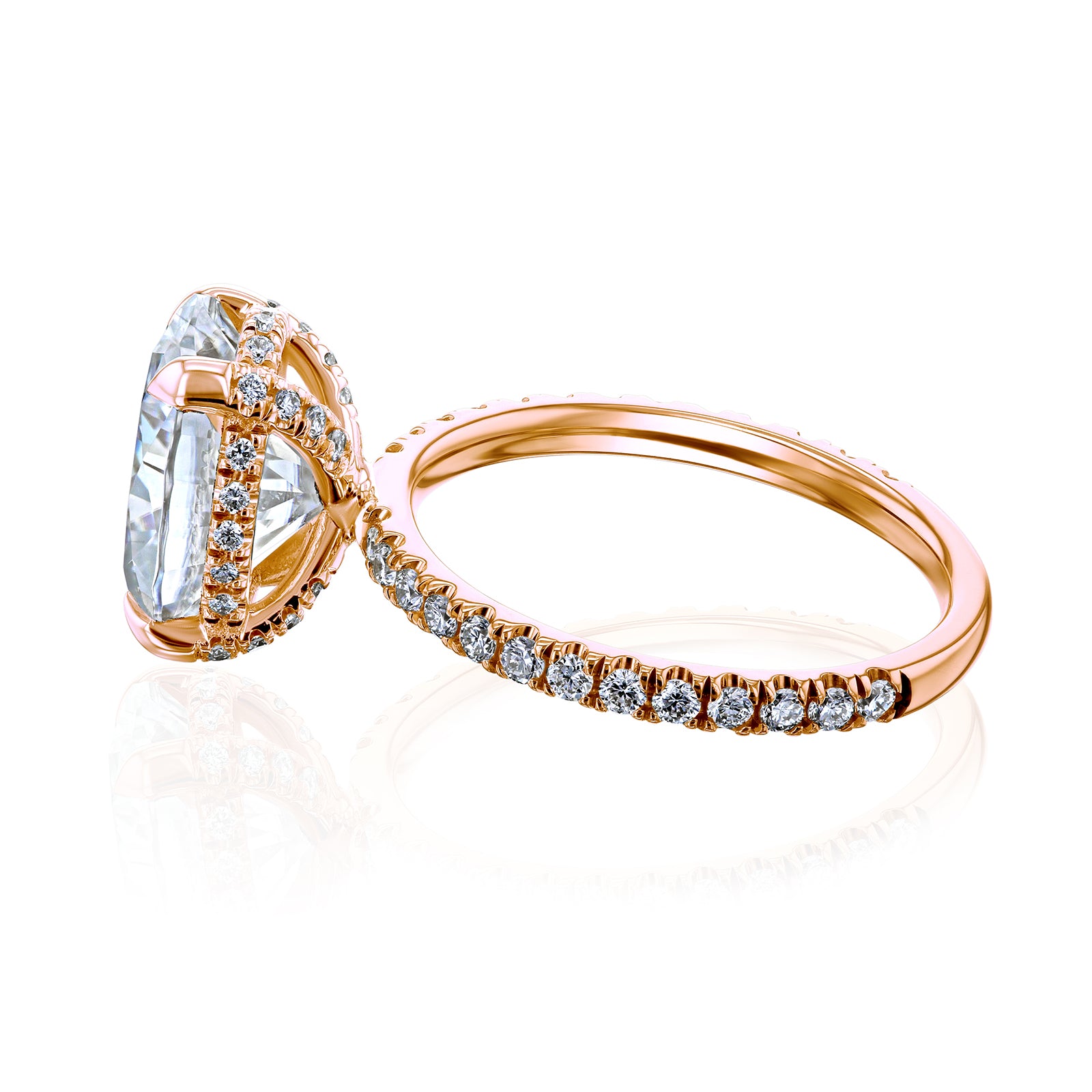 hidden basket halo on a floating setting in rose gold