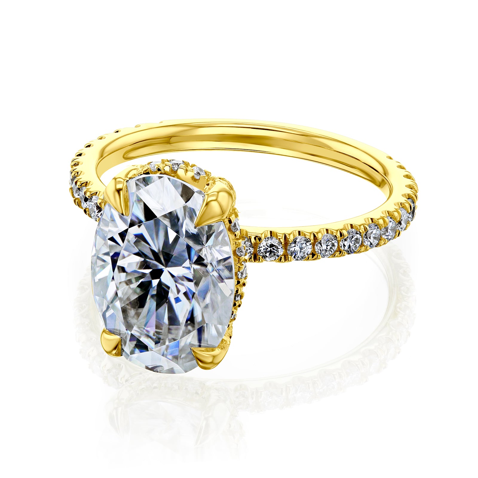 oval brilliant-cut center in yellow gold