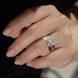 Kobelli's Dorado Bridal Set on a hand
