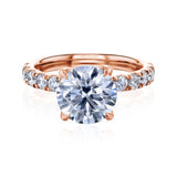 Round center diamond engagement ring in rose gold