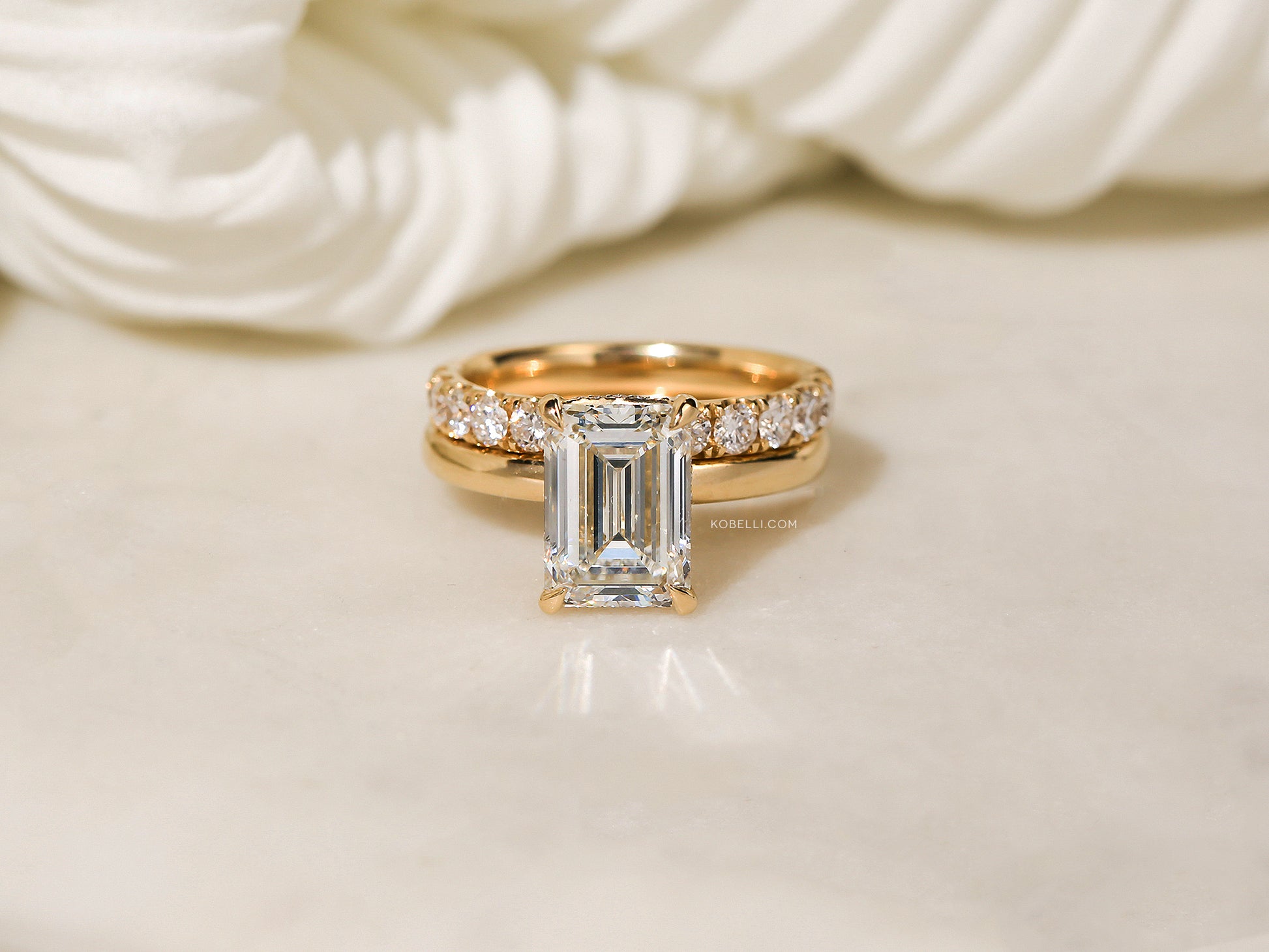 Sample of the Florence Wedding Band Ring stacked over the Noemi Engagement Ring