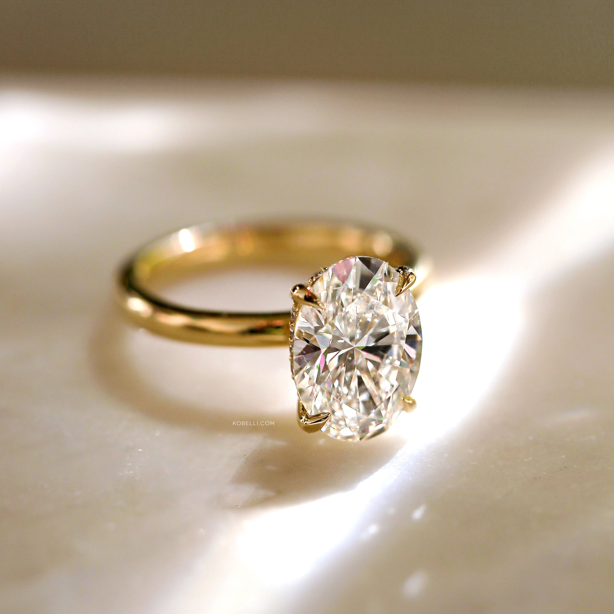 Bright oval center diamond
