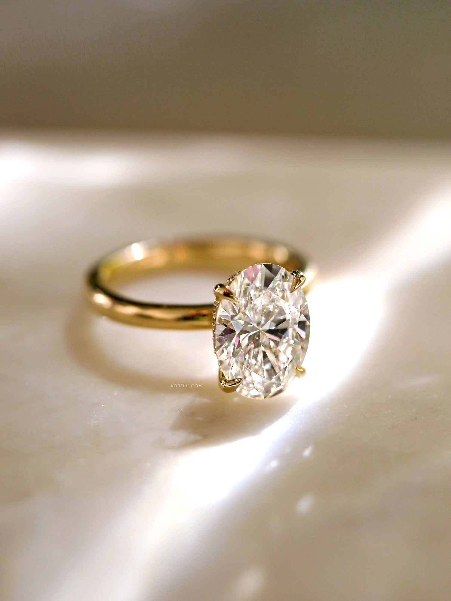 Bright oval center diamond