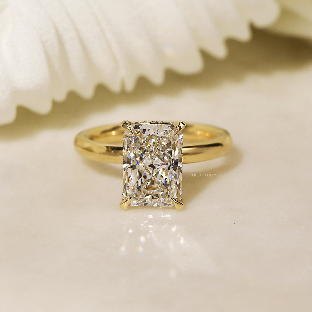 Four carat radiant center diamond