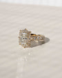 Rococo halo offers a gorgeous frame to your radiant-cut center diamond
