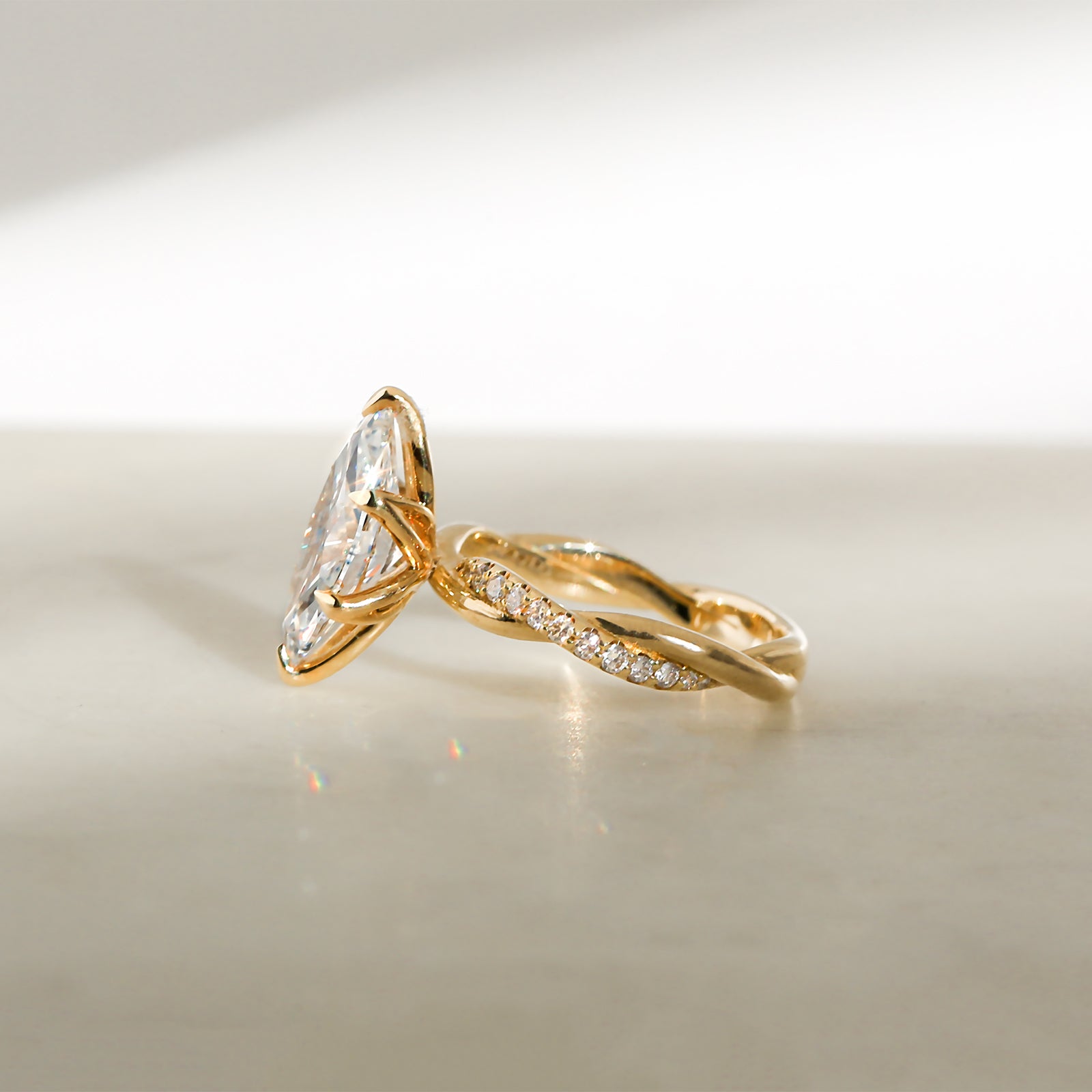 3.25 Carat Lab Grown Diamond Marquise Shifting Helix Ring - full side angle showing floating center setting