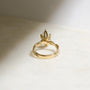 backside angle of the ring to showcase the lotus prong setting